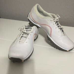Nike women’s golf shoes. Size9.5, white with pink details.